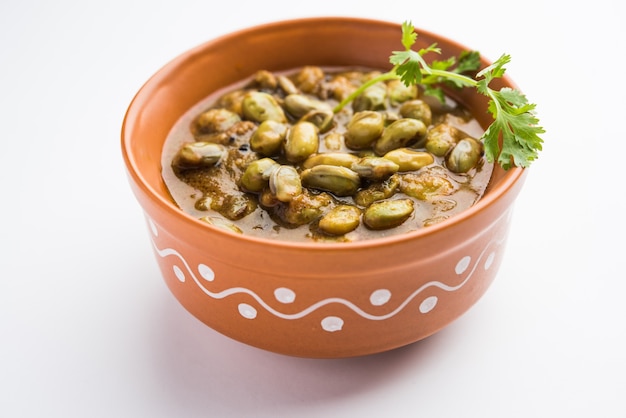 Pavta Bhaji or Lima Beans Curry Recipe also known as Popat Dana sabzi in India, served in a bowl