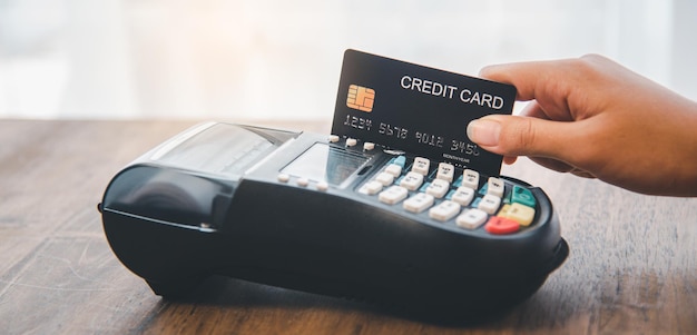 Paying by credit card , buying and selling products using a credit card swipe machine