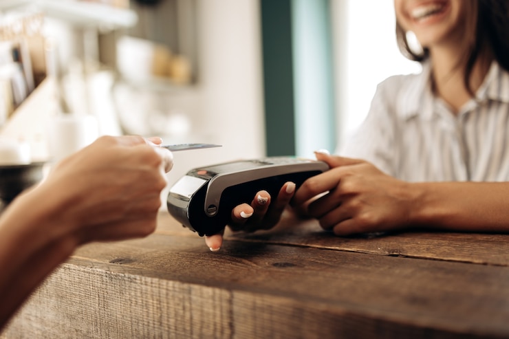 Photo payment by credit card in the flower shop