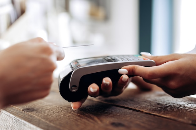 Payment by credit card in the flower shop