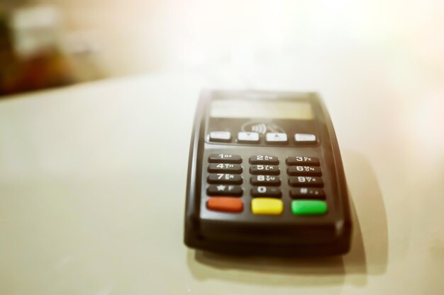 Payment terminal on a blurred background