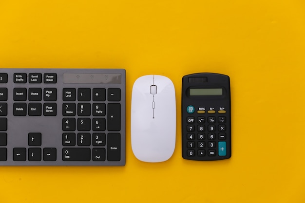 PC keyboard with calculator on yellow