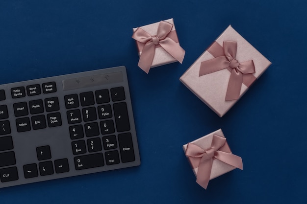 PC keyboard with gift boxes on a classic blue