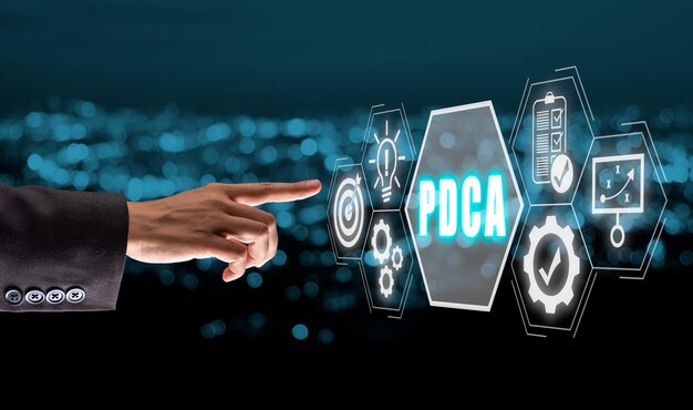 pdca plan do check act concept business person hand touching pdca icon on virtual screen