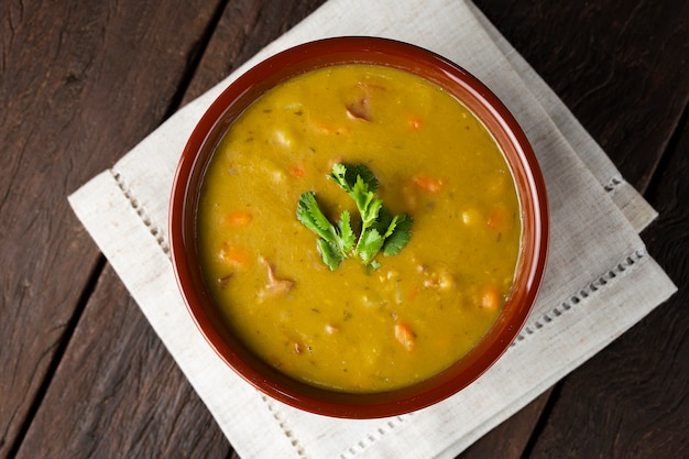 Pea soup Bowl with pea soup on the table