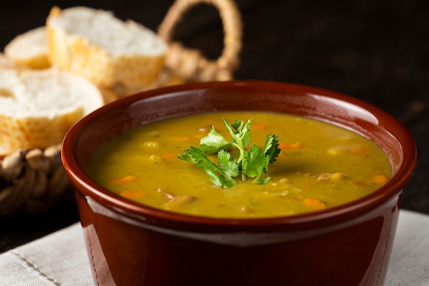 Pea soup Bowl with pea soup on the table