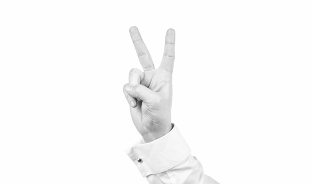 Peace gesture of male hand isolated on white background gesturing