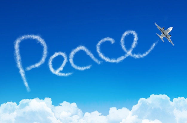 Peace - inscription in the sky left by airplane.