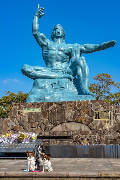 Peace statue in nagasaki peace park in sunny day a historical park commemorating the atomic bombing