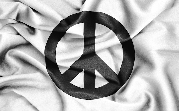 Photo a peace symbol on a white cloth