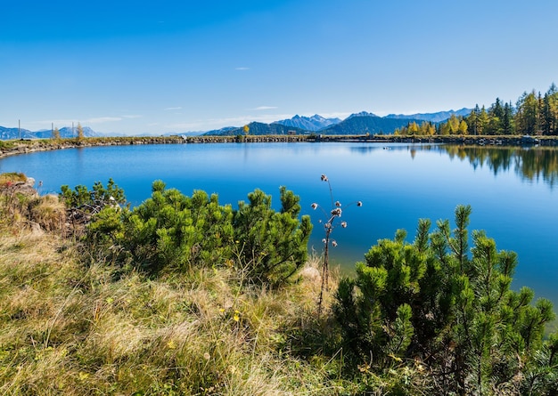 Peaceful autumn alps mountain lake with clear transparent water and reflections reiteralm steiermark austria