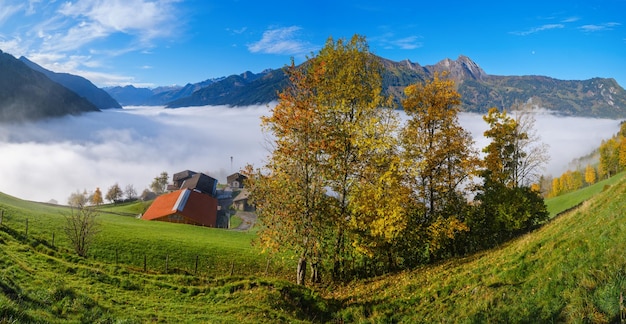 Peaceful misty autumn morning mountain view from hiking path from Dorfgastein to Paarseen lakes Land Salzburg Austria