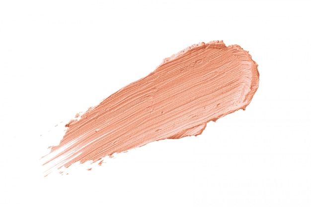 Peach color correcting concealer stroke isolated 