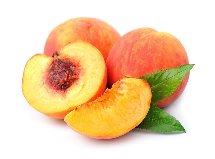 Peach fruits on a white