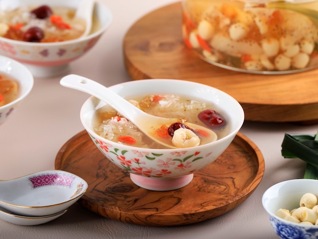 Peach gum collagen dessert is a chinese traditional refreshment\
beverages. it is contains bird nest, red dates, snow fungus, goji\
berry. selected focus