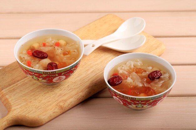 Peach gum triple collagen dessert (tao jiao), chinese\
traditional refreshment beverages contains peach gum, bird nest,\
red dates, snow fungus, goji berry, and rock sugar. copy space for\
text