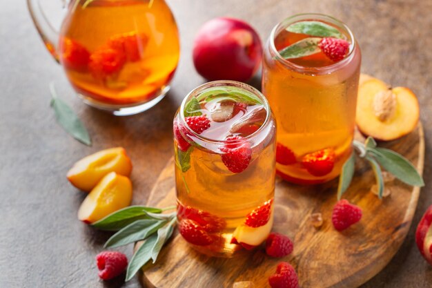 Peach raspberry iced tea summer refreshing drink beverage cocktail