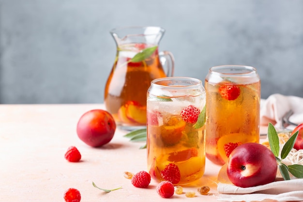 Peach raspberry iced tea summer refreshing drink beverage cocktail