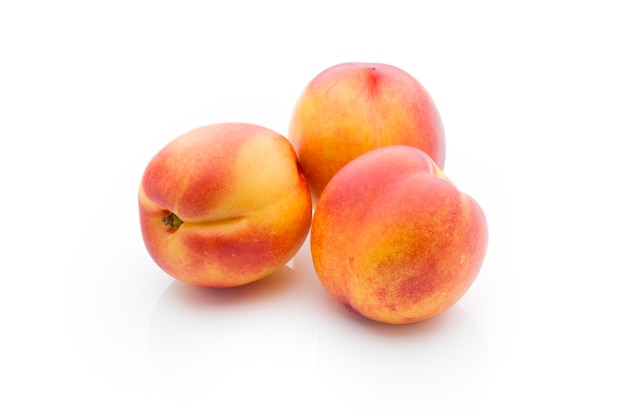 Peach on the white isolatd background.