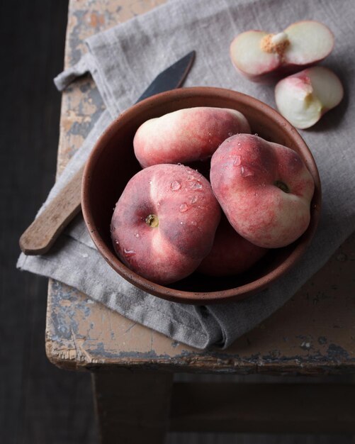 Peaches on an old rustic table