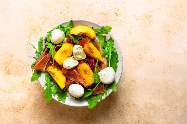 Peaches, parma ham and mozzarella salad