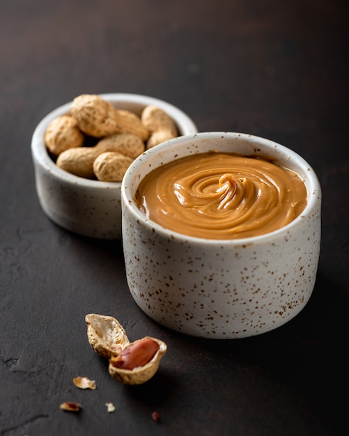 Peanut butter in a ceramic bowl on the table