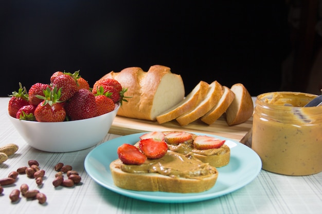 Peanut butter and strawberry sandwiches. Peanut butter and strawberry jelly sandwich