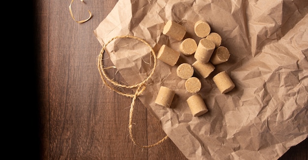 Peanut candy (paã§oca or pacoca) traditional brazilian peanut-based candy, arranged on brown paper on a table. top view.