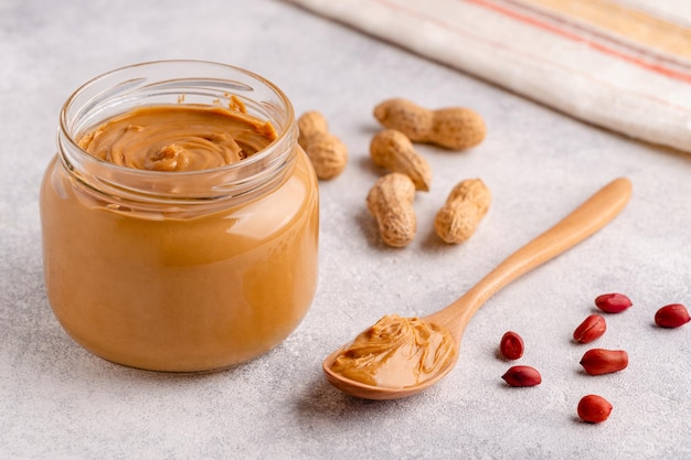 Peanut paste in an open jar