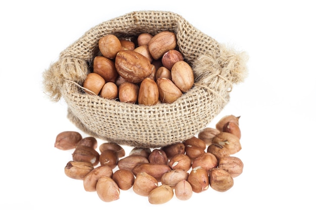 Peanut in sack on white background.