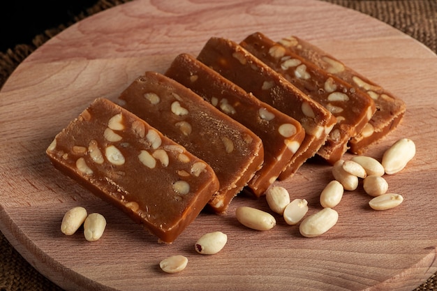 Peanut sorbet on a wooden space. Vegetarian  sweet with nuts.