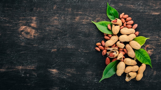 Peanut On a wooden background Top view Copy space for text