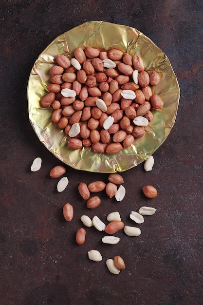 Peanuts on a brass plate