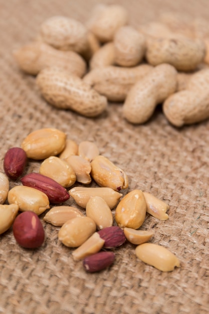 Peanuts on a burlap background