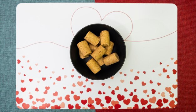 Photo peanuts shaped like candy pacoca and bread forming a delicious appetizer