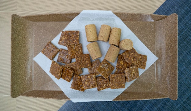 Peanuts shaped like candy pacoca and cornmeal cake