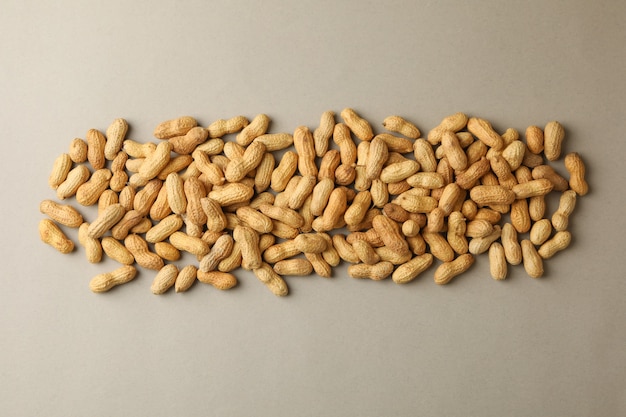 Peanuts in a shell on gray background