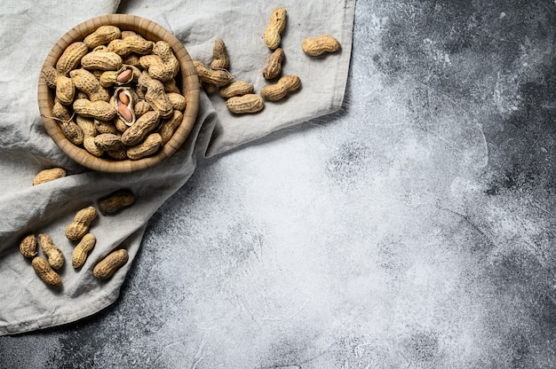 Peanuts in a shell. Vegetarian food. Top view.