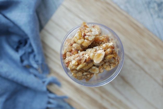 Peanuts sweet candy in a container on table