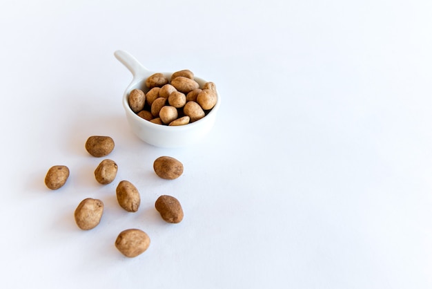 Peanuts on white background.