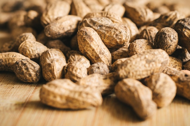 Peanuts on a wooden background