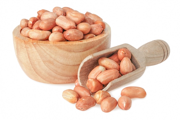 白の木製の打撃の自然な穀物の種のピーナッツ。
