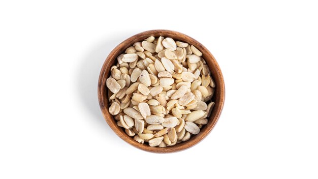 Peanuts in wooden bowl isolated on a white background. High quality photo