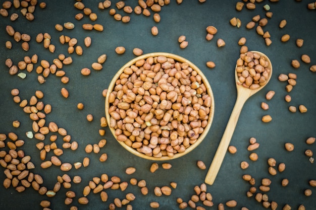 Peanuts in wooden bowl