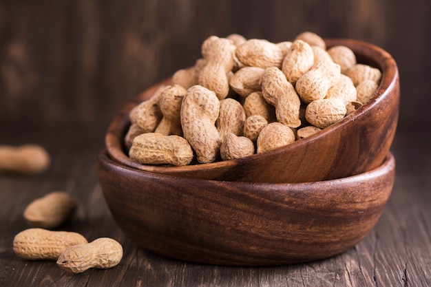 Peanuts in wooden bowls