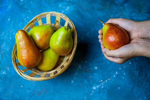 pear on a blue table  