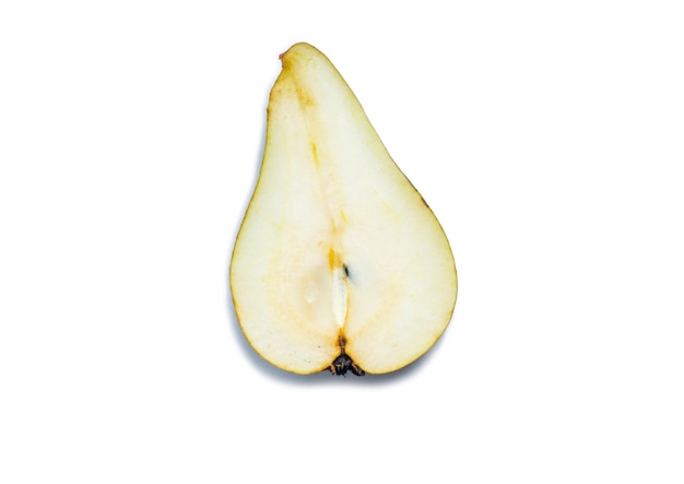 Photo a pear cut in half the pulp of a juicy fruit yellow pear on a white background food for a raw food lover delicious snack