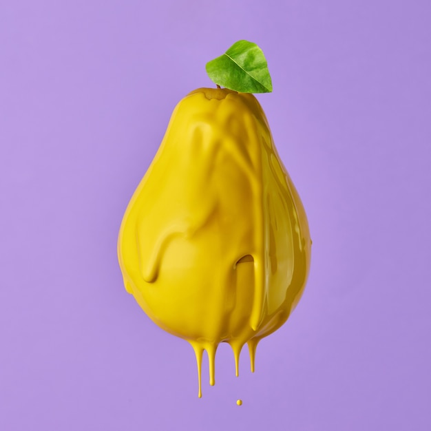 Pear isolated on purple background