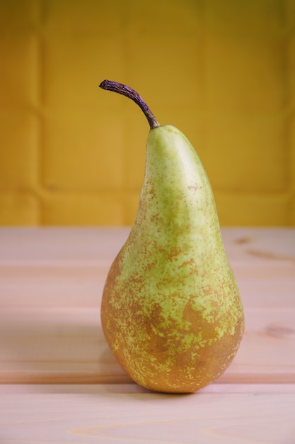 Pear on a rustic wooden kitchen