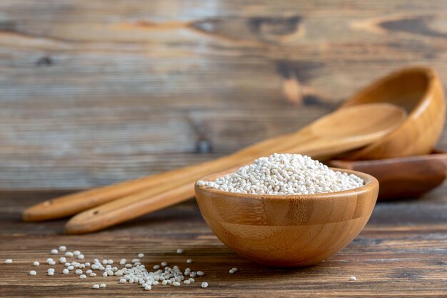 Pearl barley in a wooden bowl